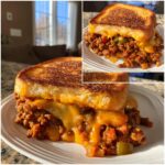 Close-up of a hearty Texas Toast Sloppy Joes sandwich overflowing with cheesy, saucy ground meat and vegetables.